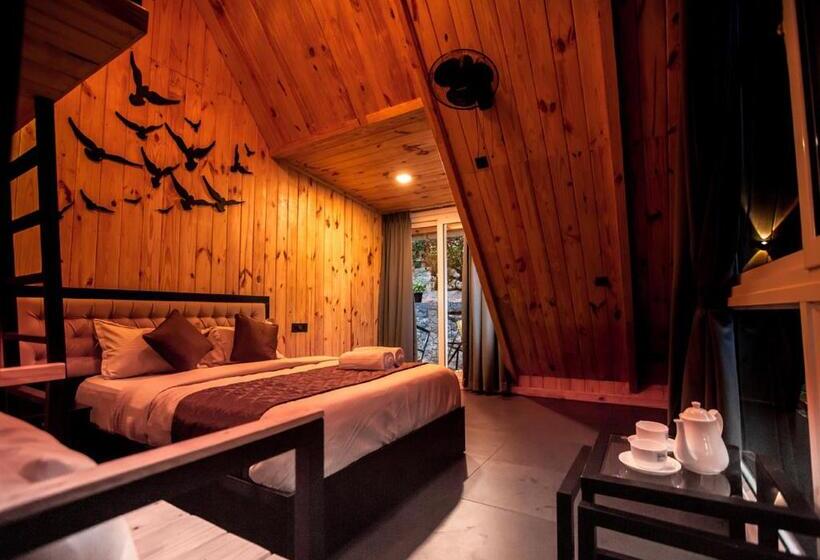 キングサイズベッドのスタンダードルーム, The Cove Lakkidi By Voye Homes