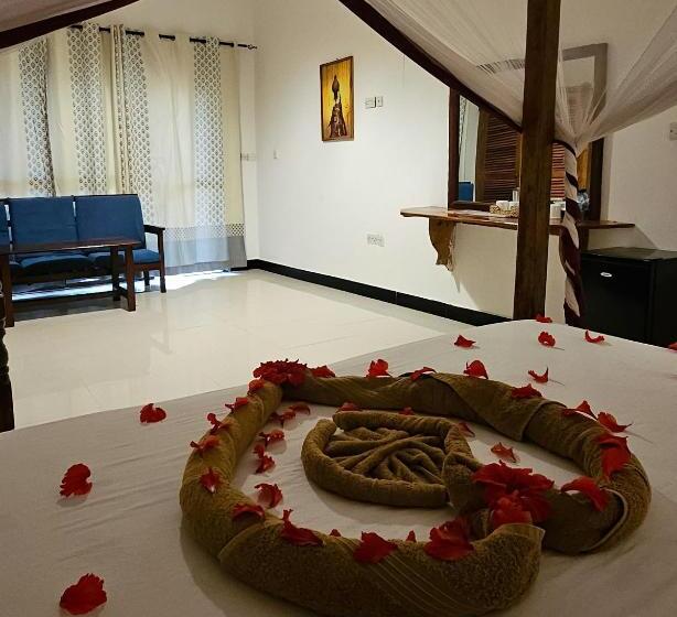 オーシャンビューのスーペリアトリプルルーム, Mango Beach Villas