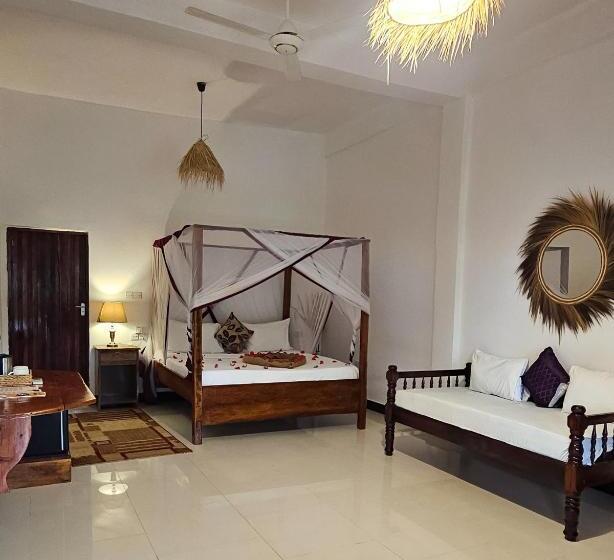 オーシャンビューのスーペリアトリプルルーム, Mango Beach Villas