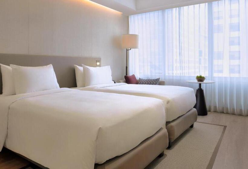 キングサイズベッドのデラックスルーム, Lanson Place Mall Of Asia Manila