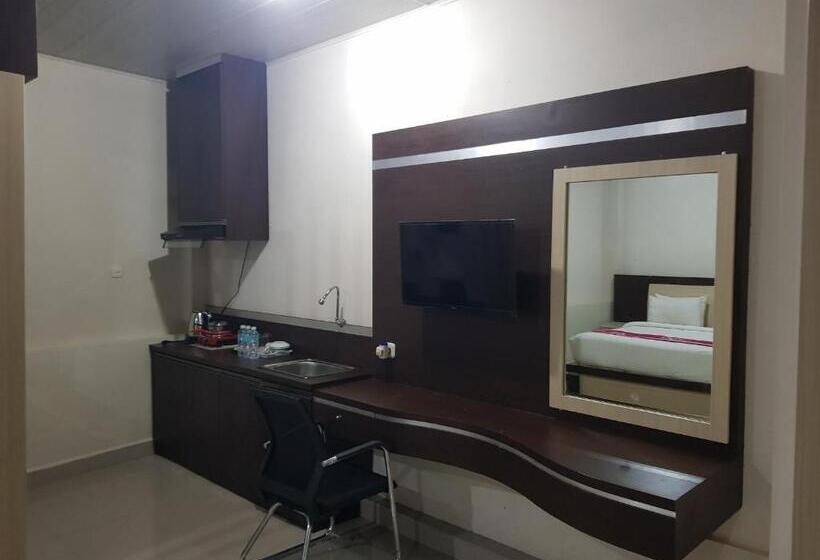 高级套房, Capital O 93263 Linge Land