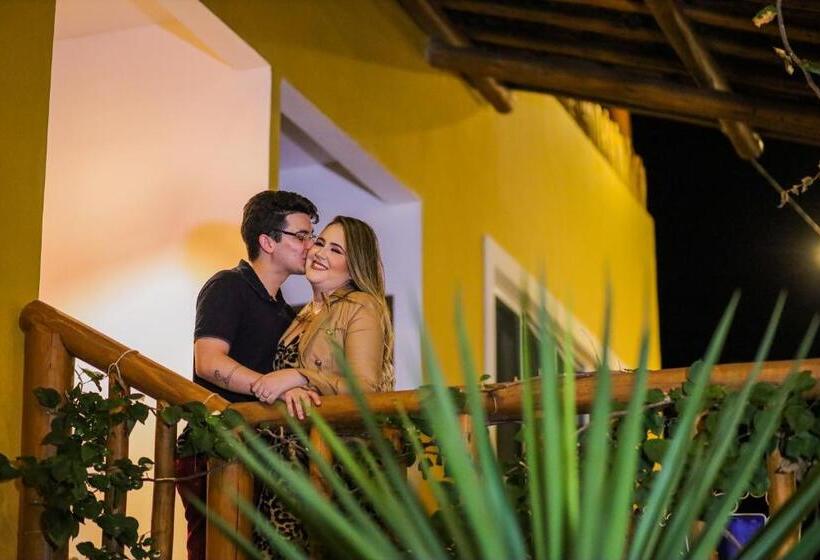 מיטת קינג בסוויטה, Pousada Matuto Sonhador