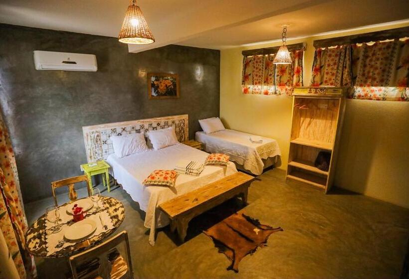 מיטת קינג בסוויטה, Pousada Matuto Sonhador