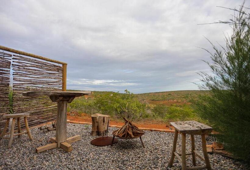 מיטת קינג בסוויטה, Pousada Matuto Sonhador