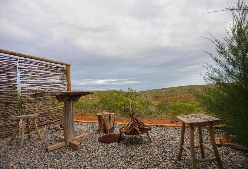 מיטת קינג בסוויטה, Pousada Matuto Sonhador