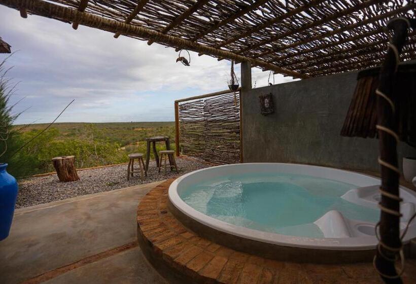 מיטת קינג בסוויטה, Pousada Matuto Sonhador