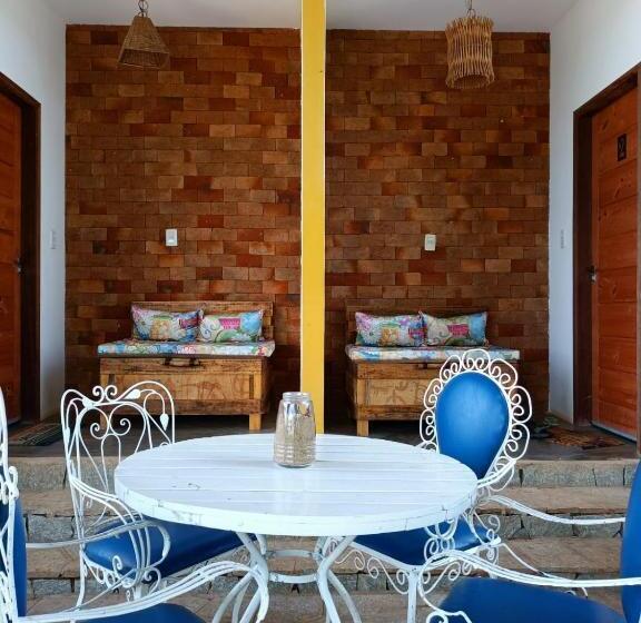 מיטת קינג בסוויטה, Pousada Matuto Sonhador