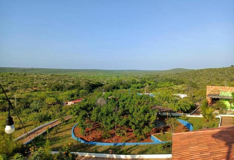 מיטת קינג בסוויטה, Pousada Matuto Sonhador