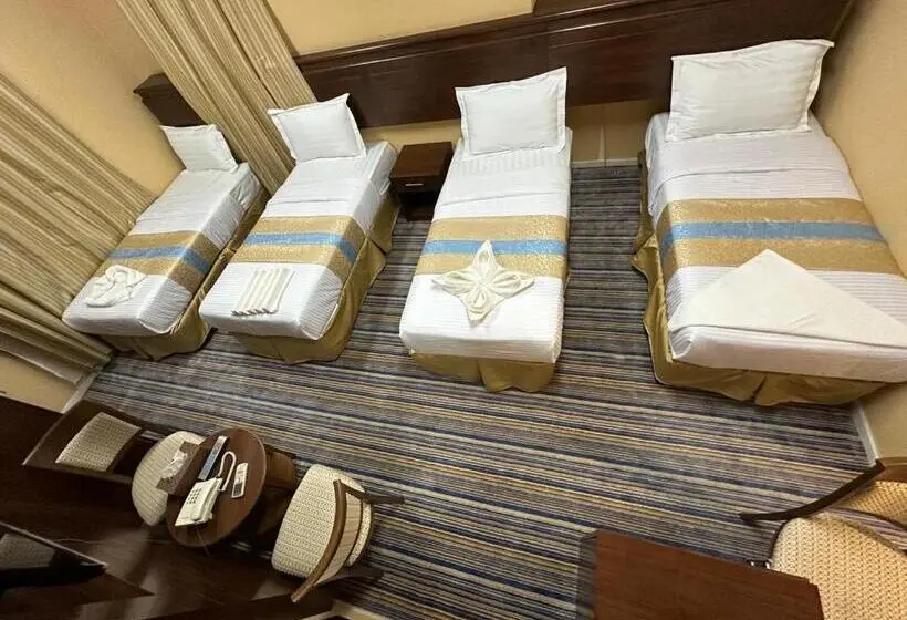 Standard Neljän Hengen Huone, فندق نجمة ذاخر توصيل مجاني من والى الحرم