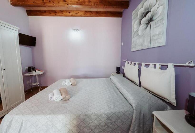 חדר סטנדרט לשלושה עם נוף לגינה, Agriturismo La Mia Terra