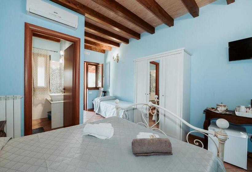 חדר סטנדרט לשלושה עם נוף לגינה, Agriturismo La Mia Terra