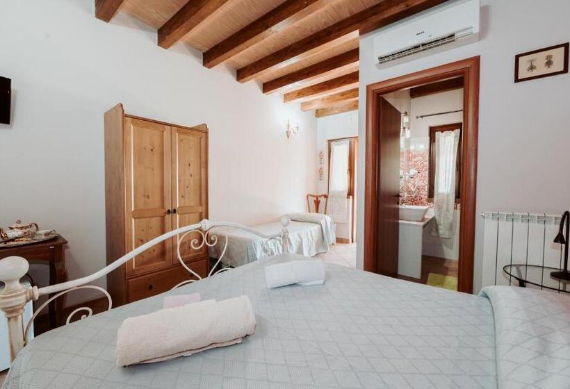 חדר סטנדרט לשלושה עם נוף לגינה, Agriturismo La Mia Terra