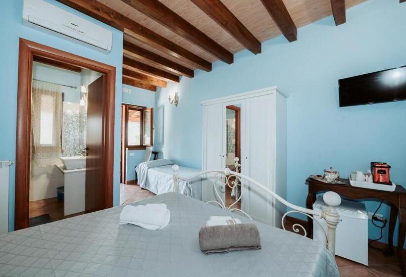 חדר סטנדרט לשלושה עם נוף לגינה, Agriturismo La Mia Terra