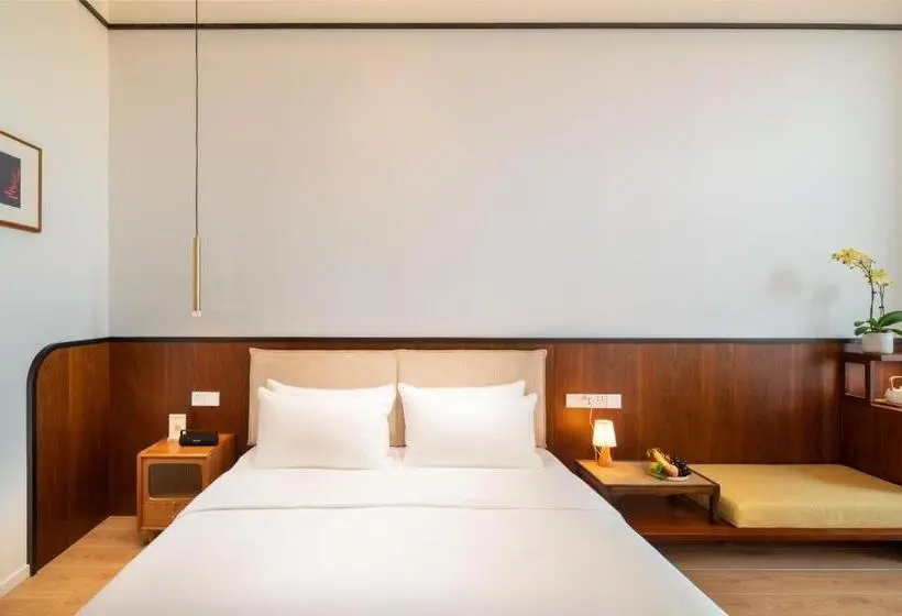 キングサイズベッドのデラックスルーム, Wuyu Hotel, Smart Park & Happy Valley Jinshansi Metro