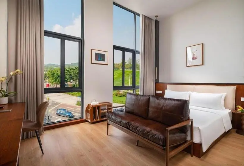 キングサイズベッドのデラックスルーム, Wuyu Hotel, Smart Park & Happy Valley Jinshansi Metro