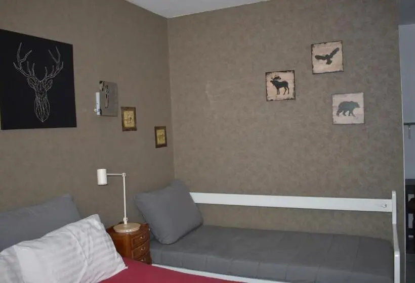 Standard Neljän Hengen Huone, Hôtel Le Mélèze