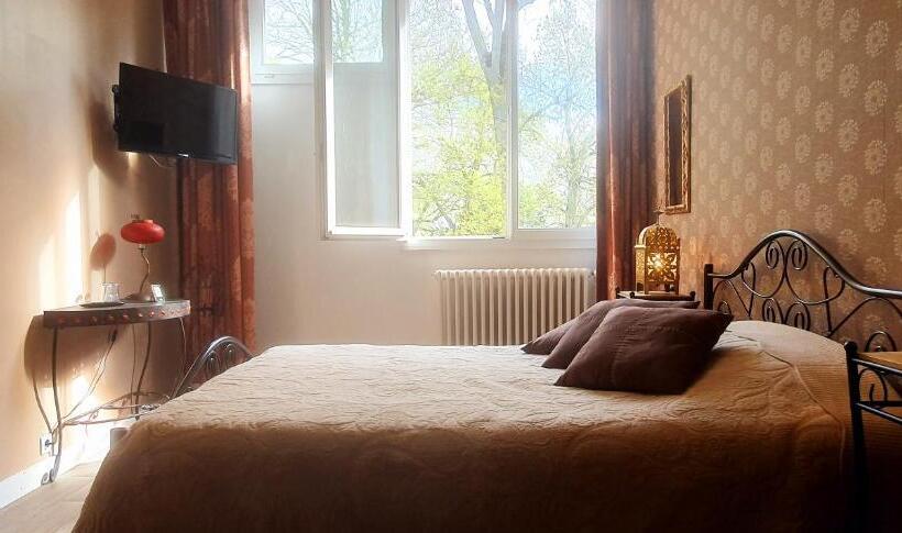 חדר לארבעה סטנדרטי עם נוף לגינה, Cosy Er Lann Chambres D Hôtes