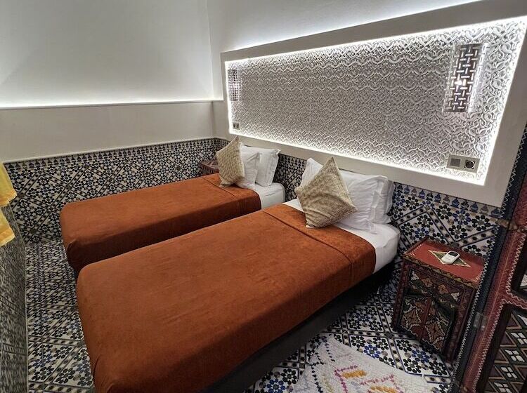 Quarto standard, Riad Andalla