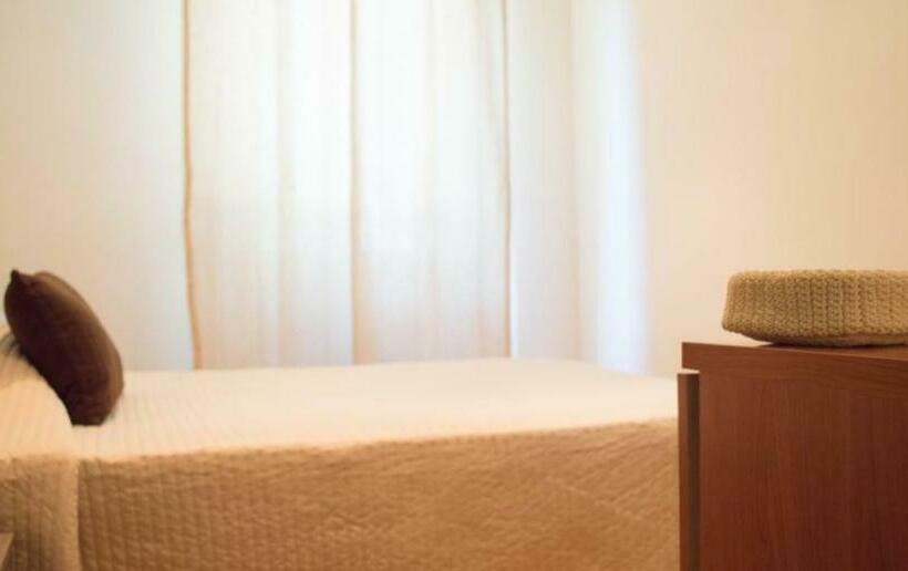 标准单人间, Guerrini