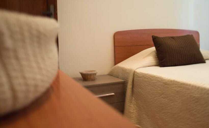 标准单人间, Guerrini