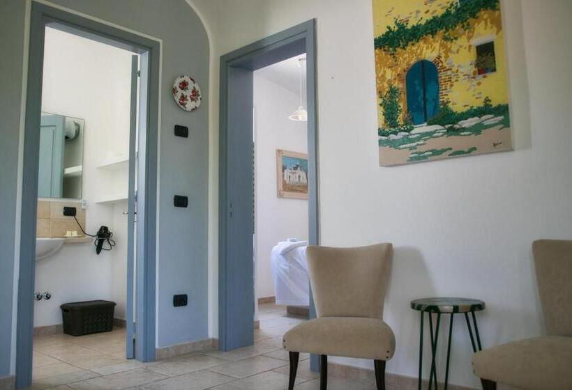 庭の見えるスタンダードトリプルルーム, Masseria Trullo Sovrano Exclusive B&b