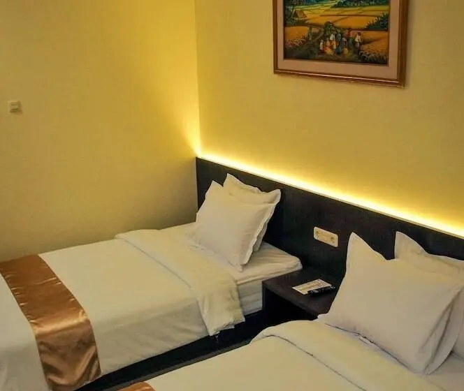 Quarto Deluxe, Alqueby Mitra Reddoorz