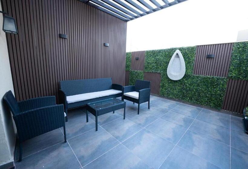 Апартаменты 1 Спальня с Террасой, شقق درر المفروشة تصميم إيطالي دخـول ذاتي