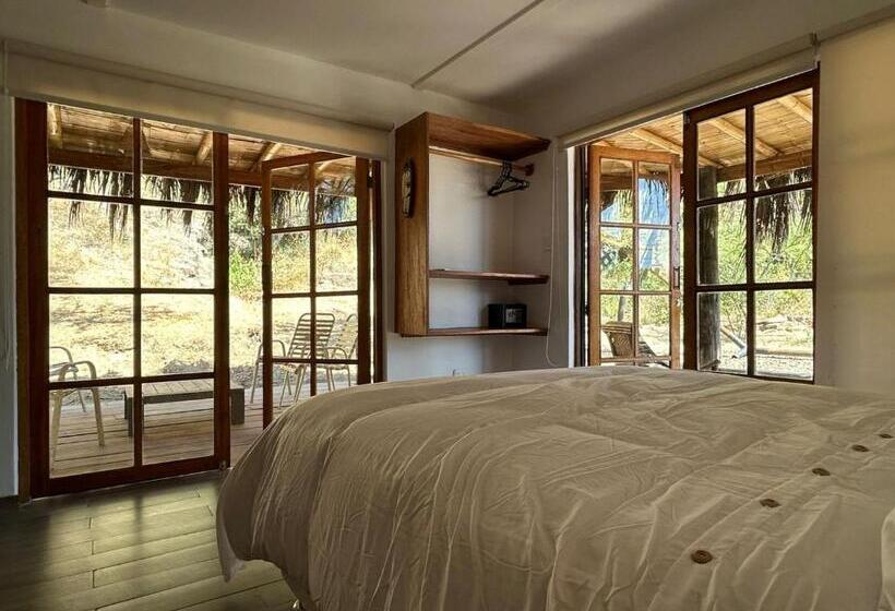 Quarto Quadruple Standart Vista Jardim, Casa Canoa