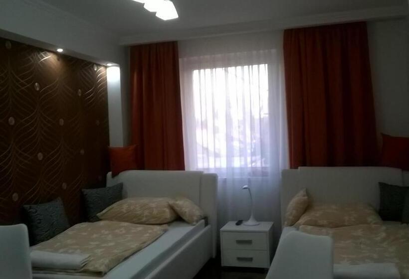 غرفة عائلية, éjjelibagoly Vendégház