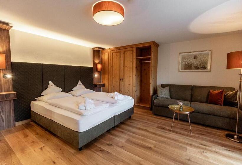 סוויטת ג'וניור נוף לגינה, Moseralm Dolomiti Spa Resort