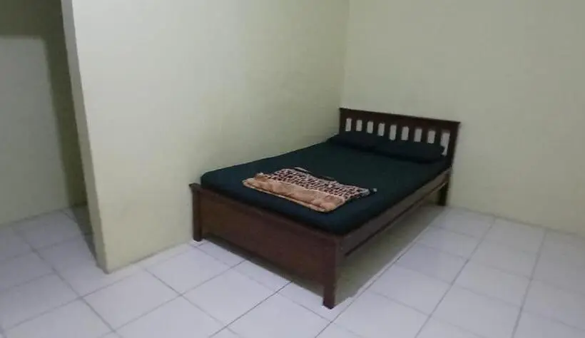 キングサイズベッドのデラックスルーム, Oyo 93861 Adinda Guest House Syariah
