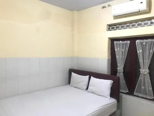 デラックスルーム, Oyo 93864 Wisma Gading Syriah