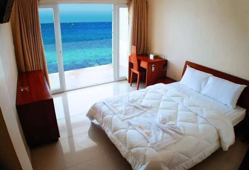 片側に海が見えるデラックスルーム, Montani Beach Resort Puerto Galera Powered By Cocotel
