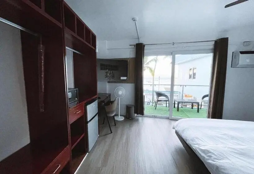 キングサイズベッドのデラックスルーム, Montani Beach Resort Puerto Galera Powered By Cocotel
