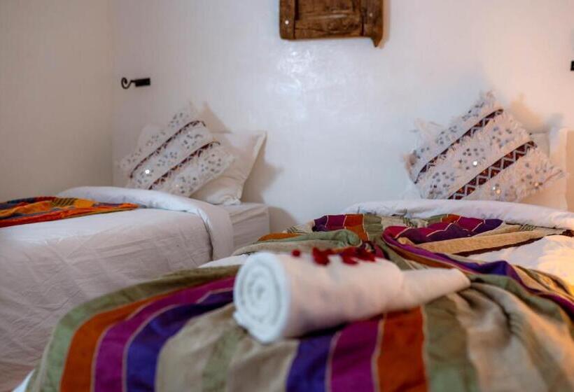 חדר סטנדרט לשלושה עם נוף לגינה, L Oasis Du Bonheur