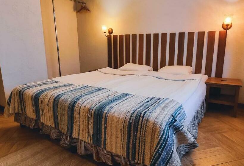 بانگلوی استاندارد, Kapteinu Osta