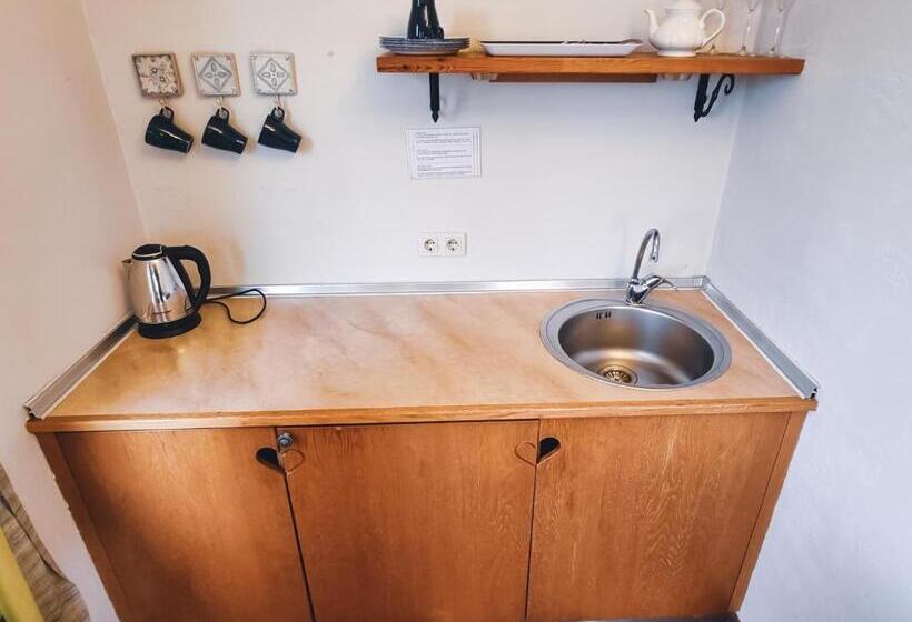 بانگلوی استاندارد, Kapteinu Osta