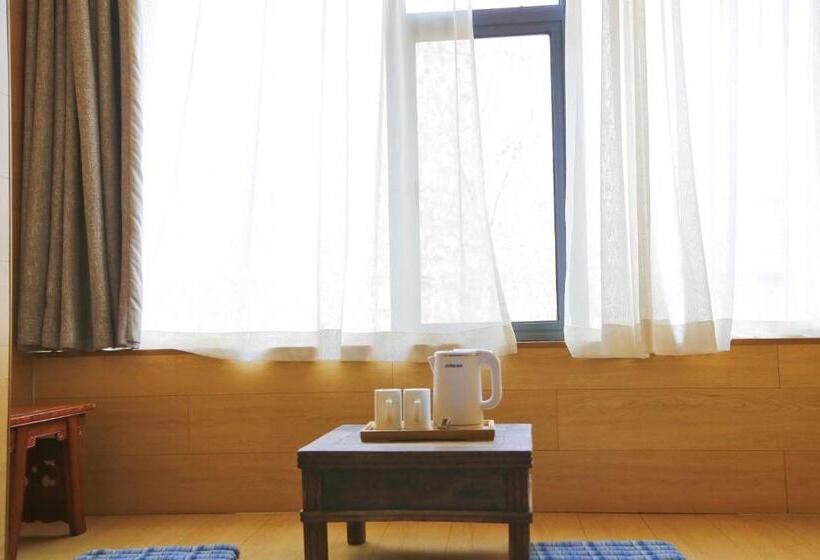 غرفة قياسية رباعية مزودة بشُرفة, Xi An Travelling With Hotel South Gate