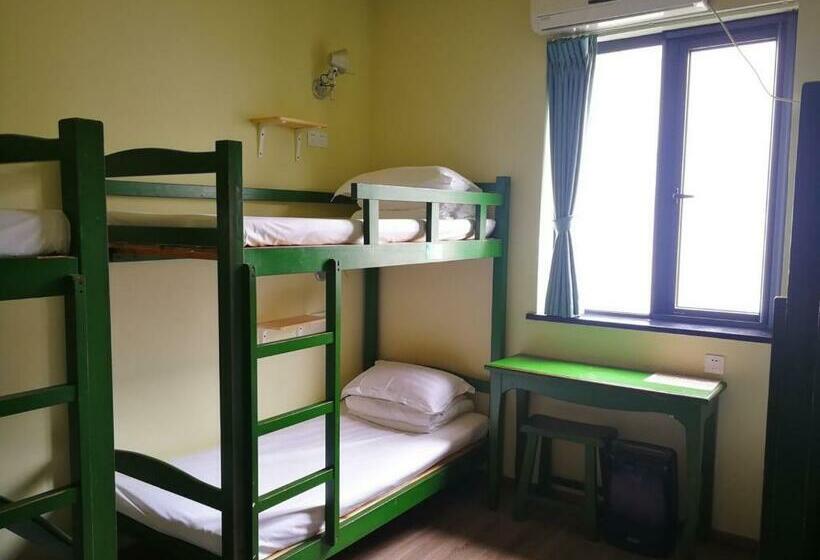 سرير فى غرفة مشتركه, Hofang Guest House