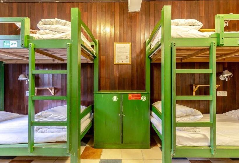 سرير فى غرفة مشتركه, Hofang Guest House