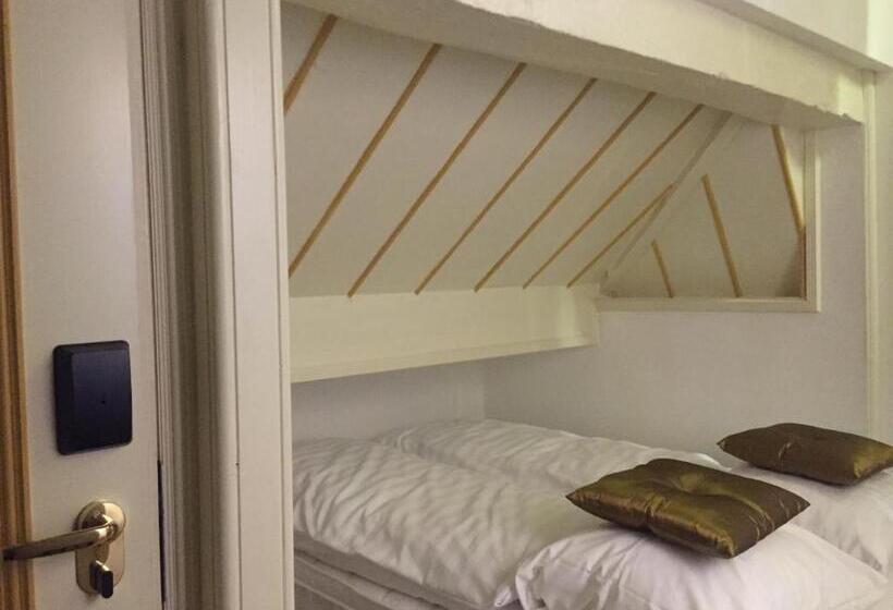 标准单人间, De Gulden Waagen