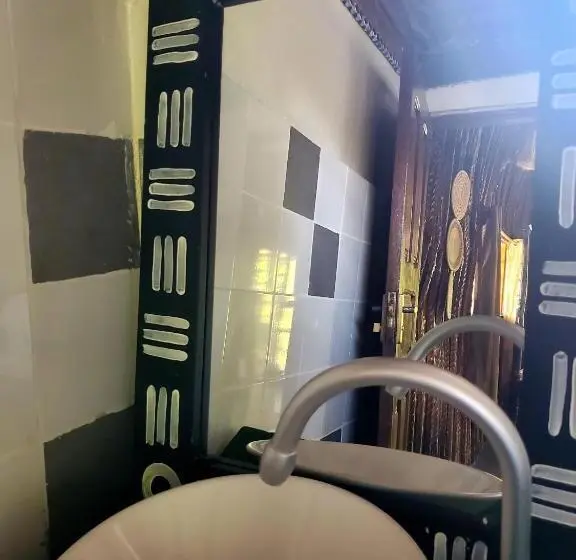 Economy Quadruple Room, Promised Land Lodge