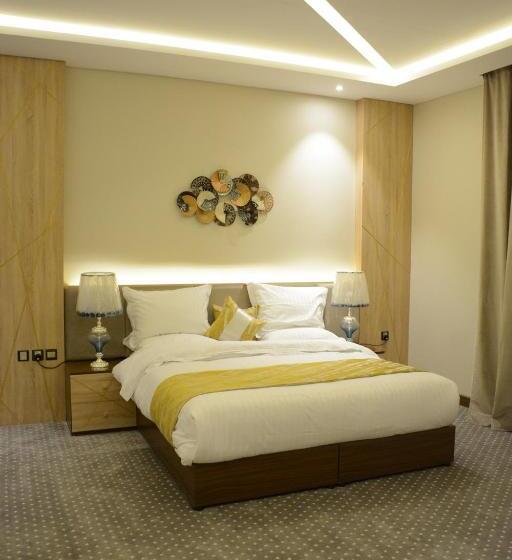 1ベッドルームのデラックスアパートメント, الايوان للاجنحة الفندقية E1