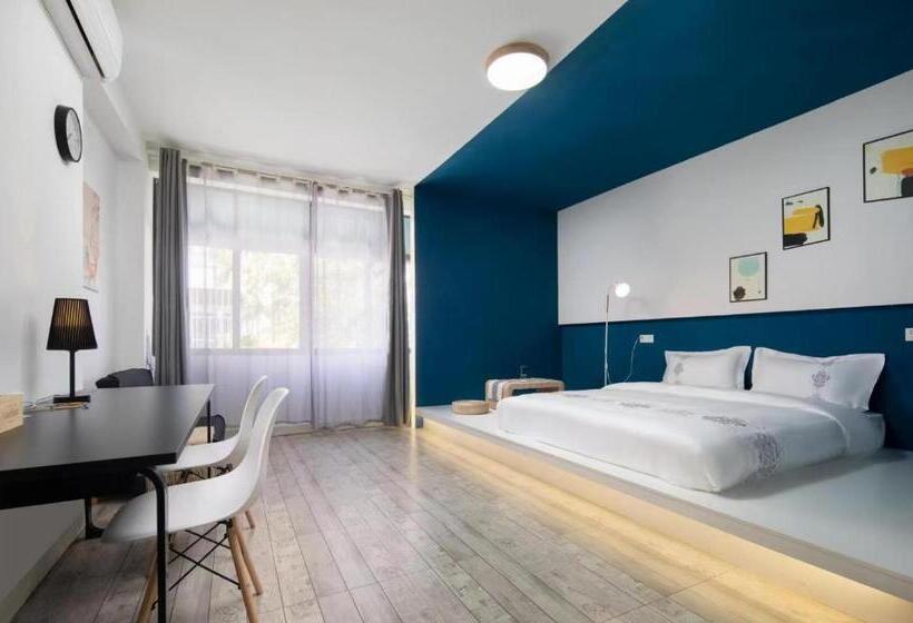 غرفة ديلوكس سرير كينج, 海口水慕青华客栈海南大学店