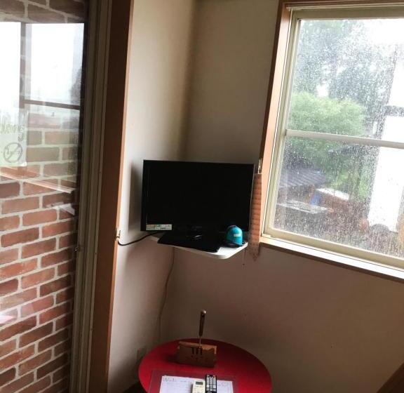 חדר סטנדרטי לארבעה עם חדר אמבטיה משותף, Kumamoto Guesthouse Minami Aso Little Asia