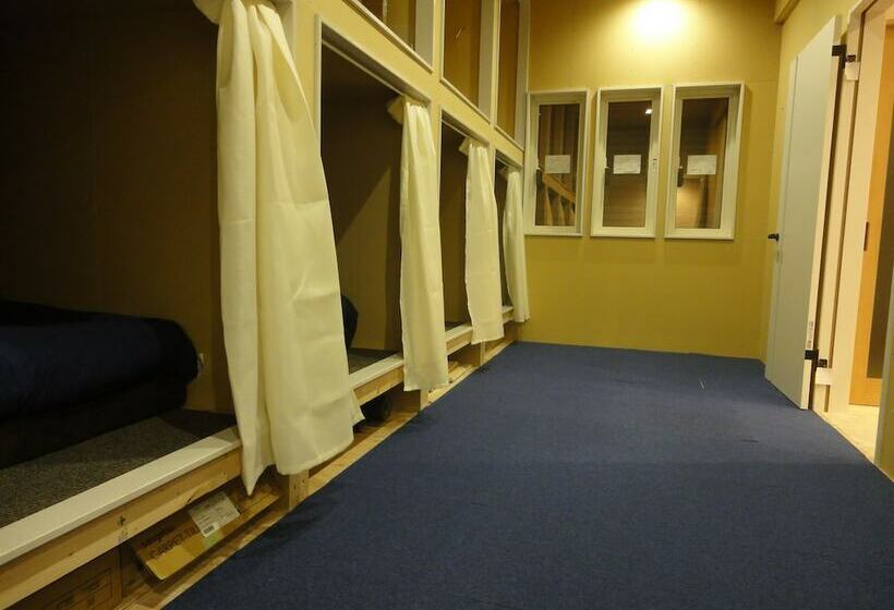 Кровать в Общей Комнате, Relak Guest House 登別 Station