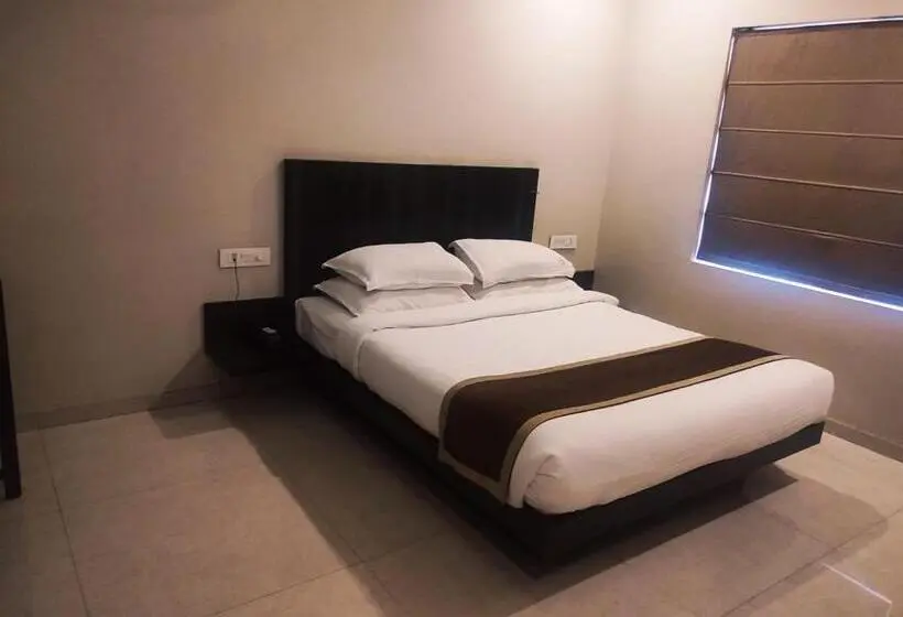 Quarto deluxe, Rasika