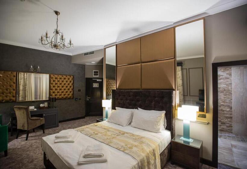 חדר דחוקס עם מיטת קינג, Peninsula Boutique