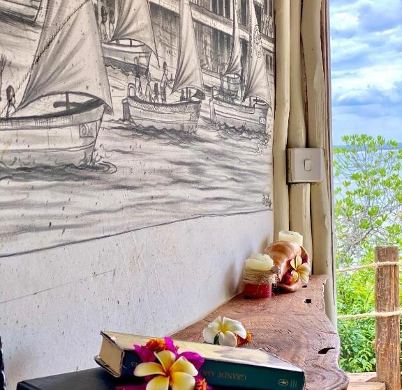 بانگلوی استاندارد با چشم‌انداز دریا, Rock And Sea Resort