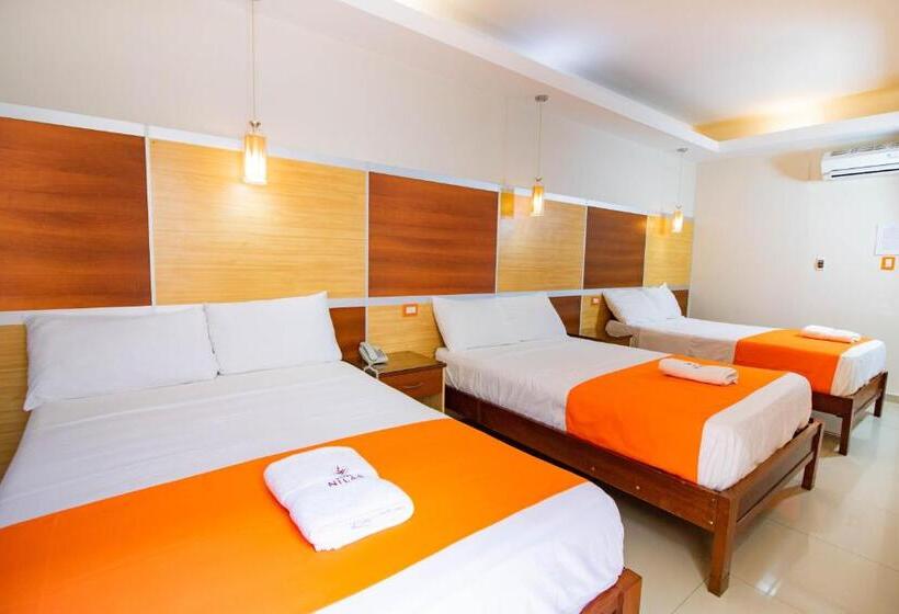 Quarto Triplo Deluxe, Nilas